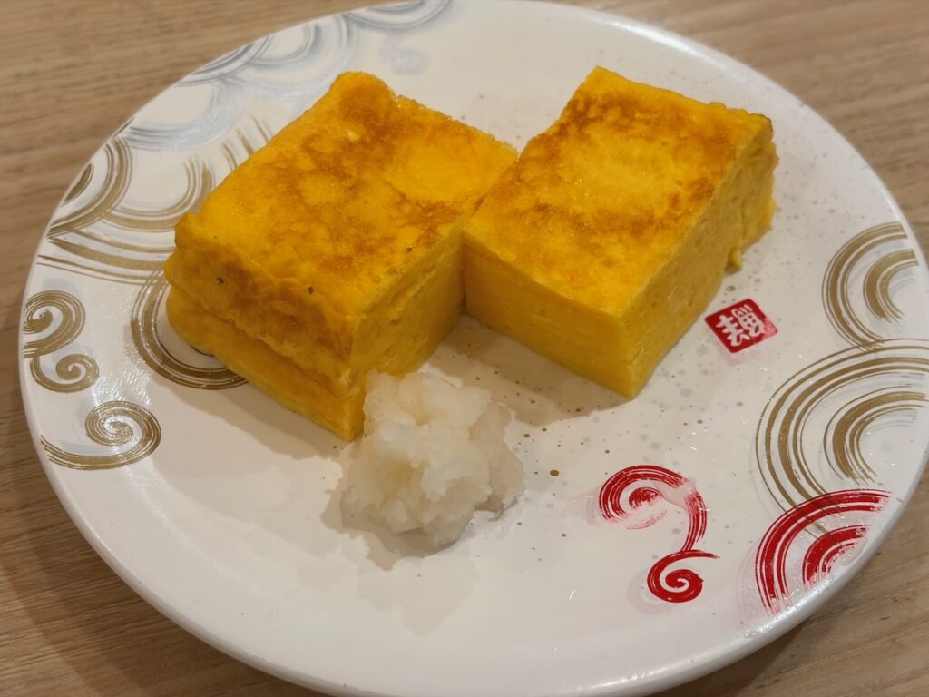 回転寿しトリトン東京スカイツリータウン・ソラマチ店の厚焼きたまご（温）
